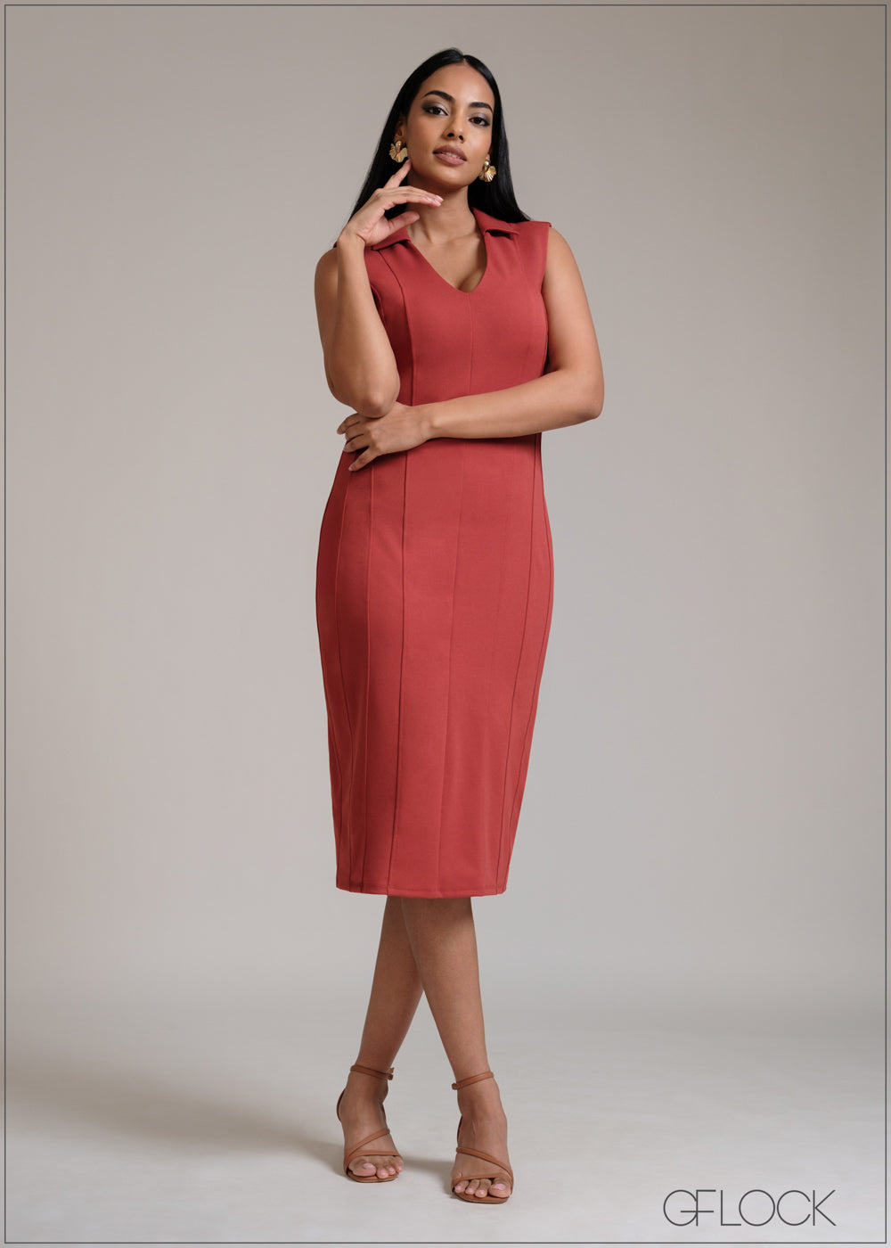 Rust and Black sleeveless midi dress with a collared V-neckline
