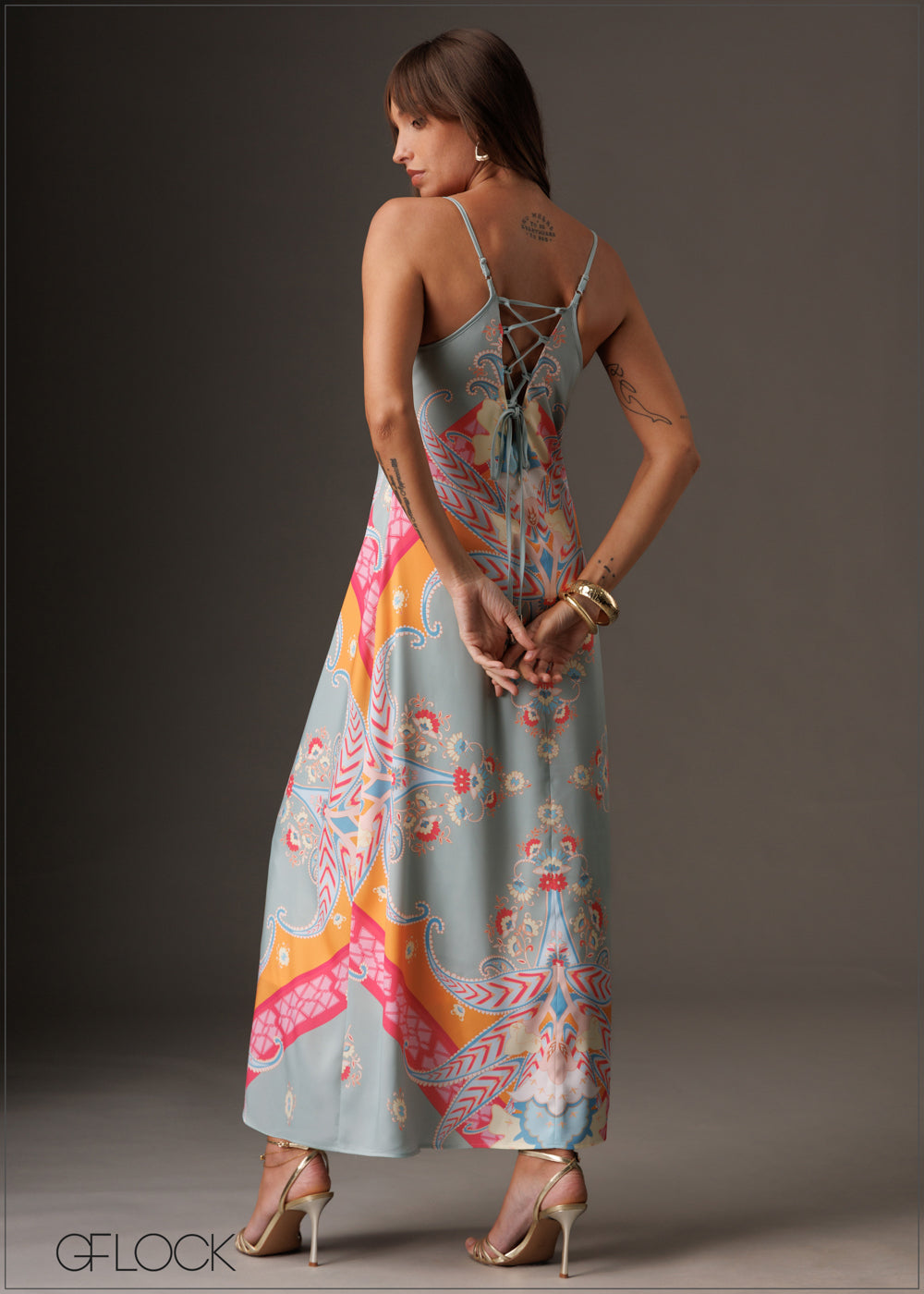 Flowy vibrant printed V-neck maxi slip dress